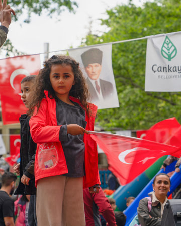 Cankaya, Ankara, Turkey - May 19 2022: Little Turkish girl waving turkish flag.のeditorial素材