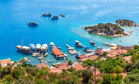 View over Kalekoy village and ruins of the Simena castle, with Kekova island across the water, in Antalya province of Turkey.の写真素材