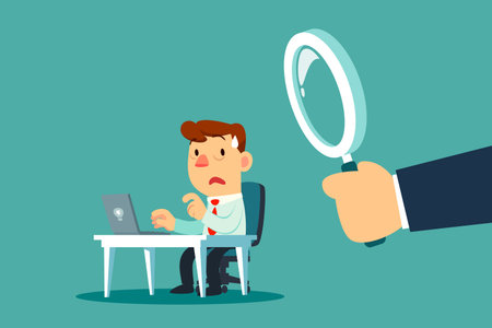 Businessman sitting at his work desk being watch by big magnifying glass behind him.のイラスト素材