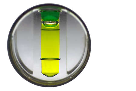 vertical air level, close-up of green liquid with bubbleの写真素材