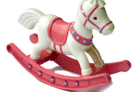Close-up of toy rocking horse against white backgroundの写真素材