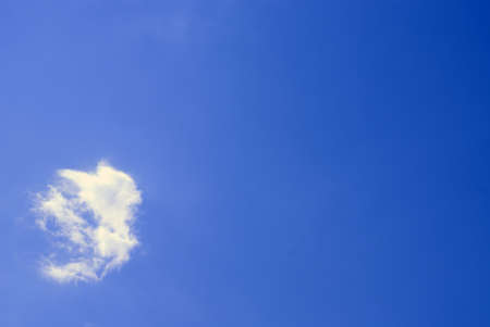Bright blue sky with cloud illuminated by the sunの写真素材