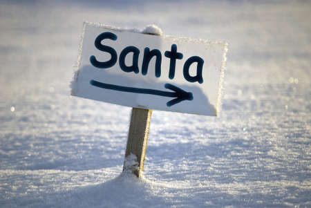 Signboard with text Santa, in the winter sceneの写真素材