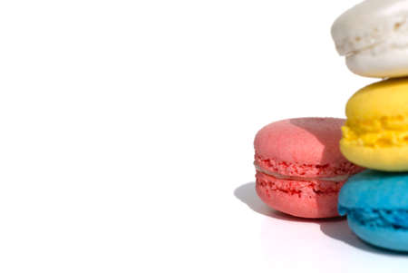 Collection of colorful macarons on a white backgroundの写真素材