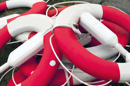 Close up of a pile of dirty lifesaving buoysの写真素材