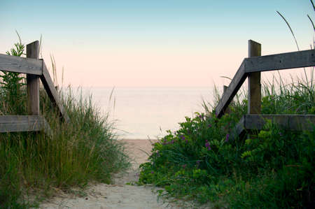 Through the fence to the beachの写真素材