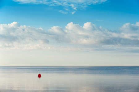 Beautiful summer background with red buoyの写真素材