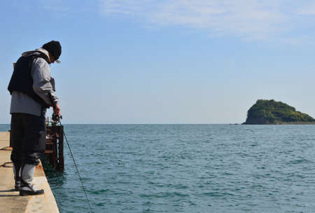 An angler and the Japanese seaの写真素材