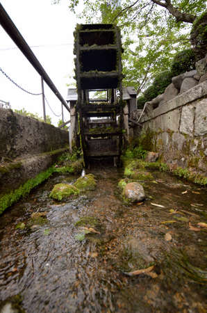 Japan's Secret Garden and water wheelの写真素材
