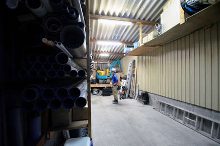 Plumber standing in the plumbing work space.の写真素材