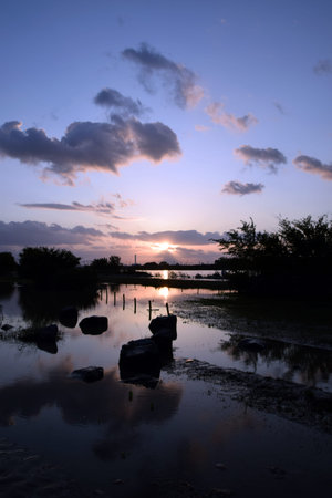 River and the sunset after the typhoon.の写真素材