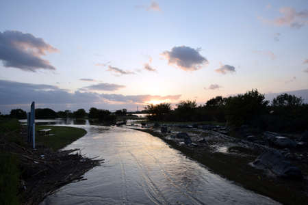 River and the sunset after the typhoon.の写真素材
