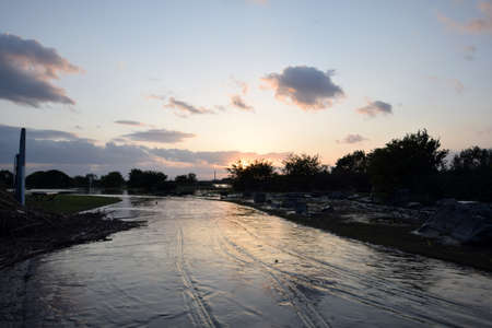 River and the sunset after the typhoon.の写真素材