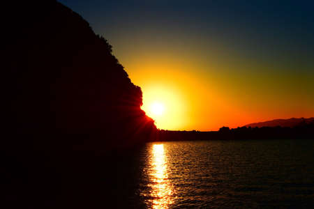 The winter sea and sunsetの写真素材