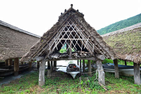 Japanese lake and boat house.の写真素材