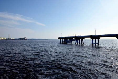 Dusk and pipeline and ocean in Osakaの写真素材