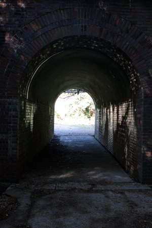 A world peeking through the tunnel in Japan.の写真素材