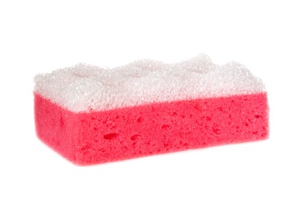 Pink porous bath sponge isolated on whiteの写真素材