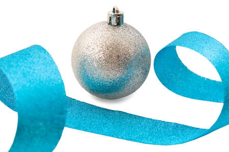 Silver christmas glass ball  and blue ribbon isolatedの写真素材