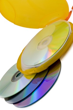 Portable yellow  CD/DVD case on white backgroundの写真素材