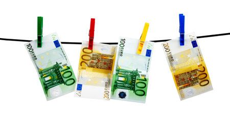 Banknotes drying on a rope after laundry
