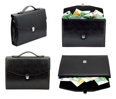 Black briefcase with money on a white backgroundの写真素材