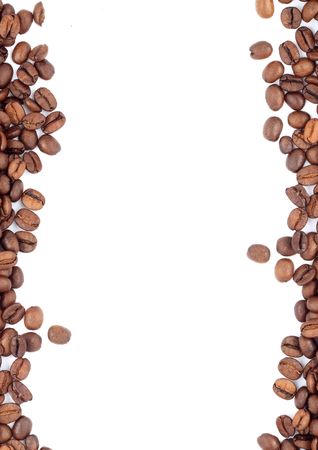 Brown roasted coffee beans isolated on white backgroundの写真素材