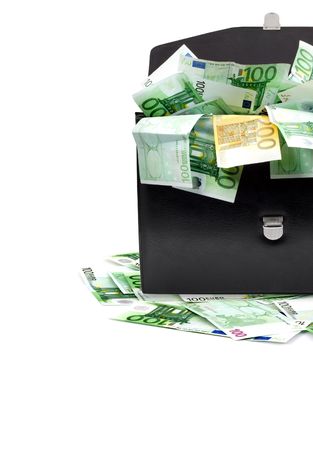 Black briefcase with money on a white backgroundの写真素材