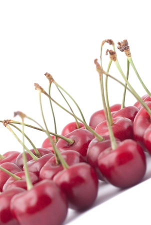 Red cherries isolated on a white backgroundの写真素材