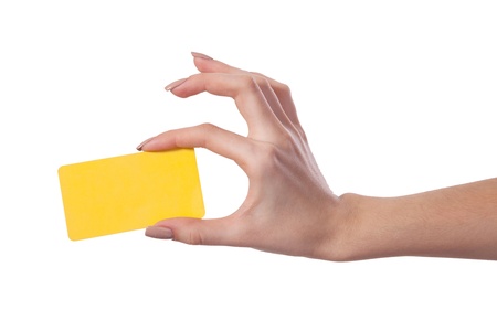 Businesswoman's hand holding blank paper business card, closeup isolated on white backgroundの写真素材