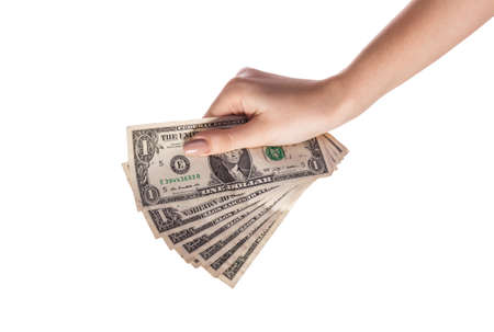 Woman hand with dollars isolated on white backgroundの写真素材