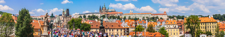 PRAGUE, CZECH REPUBLIC - JUNE 11: Tourists on Charles Bridge, June 11, 2013, Prague,Czech Republic. Annually Prague is visited by more than 3,5 million touristsのeditorial素材