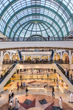 DUBAI, UAE - APRIL 29: Shoppers at Mall of the Emirates on April 29, 2013 in Dubai. Mall of the Emirates is a shopping mall in the Al Barsha district of Dubai.のeditorial素材
