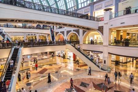 DUBAI, UAE - APRIL 29: Shoppers at Mall of the Emirates on April 29, 2013 in Dubai. Mall of the Emirates is a shopping mall in the Al Barsha district of Dubai.のeditorial素材
