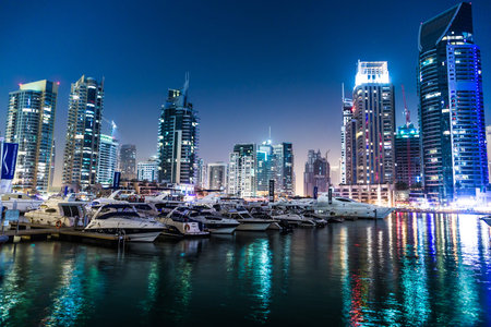 DUBAI, UAE - NOVEMBER 13: Dubai downtown night scene with city lights, luxury new high tech town in middle East. Dubai Marina cityscape,  on November 13, 2012 in Dubai, UAE.のeditorial素材