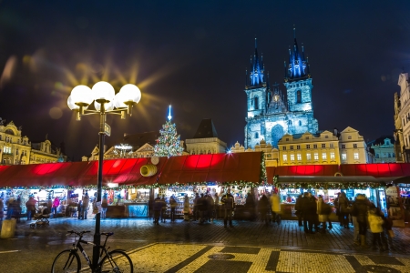 PRAGUE, CZECH REPUBLIC - DEC 17: Group of people enjoy Christmas market in Prague on December 17, 2012 in Prague. It attracts more than 750 thousands of visitors during the whole advent time.のeditorial素材