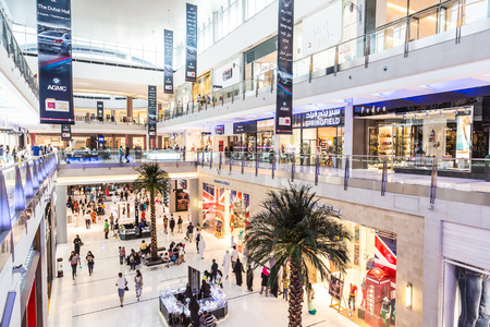 DUBAI, UAE - NOVEMBER 14: Shoppers at Dubai Mall on November 14, 2012 in Dubai. At over 12 million sq ft, it is the world's largest shopping mall based on total area and 6th largest by gross leasable area.のeditorial素材