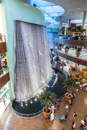 DUBAI, UAE - NOVEMBER 14: Shoppers at Dubai Mall on November 14, 2012 in Dubai. At over 12 million sq ft, it is the world's largest shopping mall based on total area and 6th largest by gross leasable area.のeditorial素材