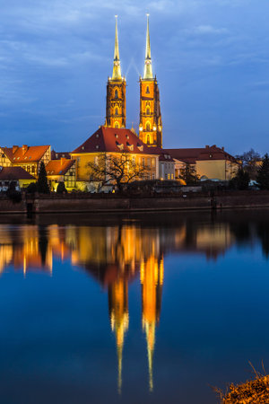 A cityscape cathedral, river Odra. Wroclaw, Poland, at duskの写真素材