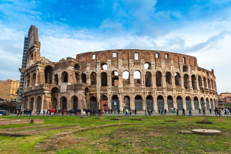ROME - DECEMBER 21: Coliseum exterior on December 21, 2013 in Rome, Italy. The Coliseum is one of Rome's most popular tourist attractions with over 5 million visitors per year.のeditorial素材