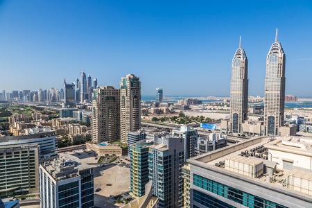 DUBAI, UAE - NOVEMBER 13: Modern skyscrapers in Dubai (emirate and city), UAE. Dubai now boasts more completed skyscrapers higher than 0,8 - 0,25 km than any other city on 13 November 2013  in Dubai.のeditorial素材
