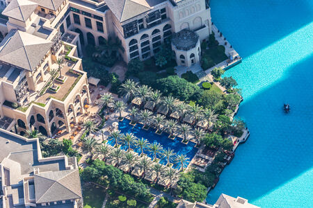 DUBAI, UAE - NOVEMBER 13: Aerial view of Downtown Dubai with man made lake and skyscrapers from the tallest building in the world, Burj Khalifa, at 828m, taken on 13 November 2013 in Dubai.のeditorial素材