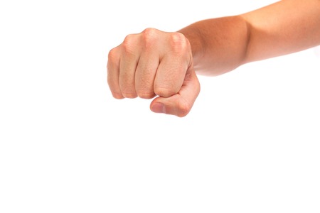 Hand with clenched a fist, isolated on a white backgroundの写真素材