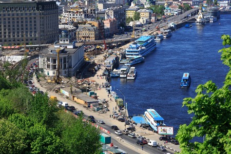 KIEV, UKRAINE - MAY 07: River port and bridge on  a river Dnepr, May 07, 2013, in town Kiev, Ukraine, built in 1157-1961.のeditorial素材