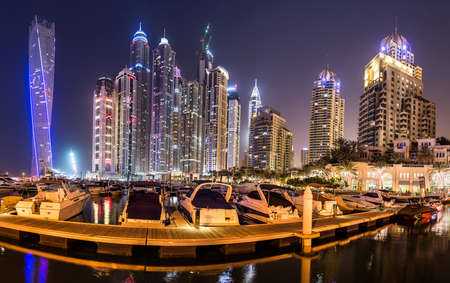 DUBAI, UAE - NOVEMBER 13: Dubai downtown night scene with city lights, luxury new high tech town in middle East. Dubai Marina cityscape,  on November 13, 2012 in Dubai, UAE.のeditorial素材