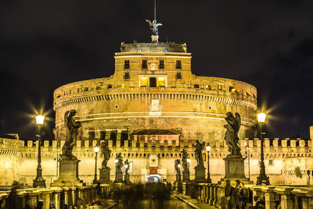 The Mausoleum of Hadrian, usually known as Castel Sant'Angelo and the Sant'Angelo bridge illuminated by night. Photo Rome, Italyのeditorial素材