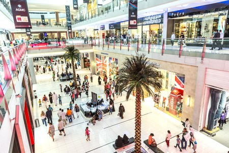 DUBAI, UAE - NOVEMBER 14: Shoppers at Dubai Mall on November 14, 2012 in Dubai. At over 12 million sq ft, it is the world's largest shopping mall based on total area and 6th largest by gross leasable area.のeditorial素材