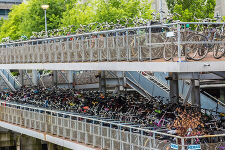 AMSTERDAM, NETHERLANDS - AUGUST 19: Huge bicycle parking in the center of Amsterdam  on August 19, 2014のeditorial素材