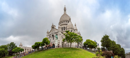 PARIS, FRANCE - JULY 14 2014: Basilica of the Sacred Heart of Jesus. Seen from Montmartre hill in Paris, July 14, 2014のeditorial素材