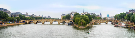 PARIS, FRANCE - JULY 14 2014: Seine and Notre Dame de Paris cathedral is one of the most visited places in France and one of the most famous symbols of Paris, July 14, 2014のeditorial素材